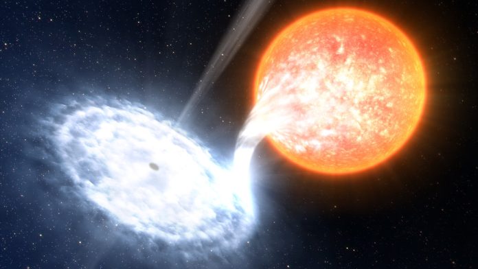 Encuentran una estrella similar al Sol que orbita un agujero negro cercano