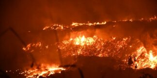 El cuerpo de bomberos en conjunto con helicópteros de la Fuerza Aérea de República Dominicana (FARD) lograron sofocar el incendio que se registró la noche del miércoles en un depósito de basura localizado en la avenida Hípica, en las proximidades de la Base Aérea de San Isidro en Santo Domingo Este.