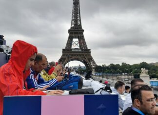 París frenético, bailando bajo la lluvia en Juegos Olímpicos