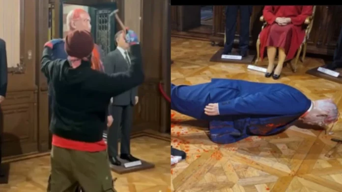 Activista destruye a martillazos figura de cera de Netanyahu en México