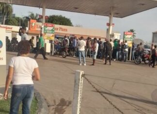 Identifican a policía y civil muertos a tiros mutuamente en estación de combustible